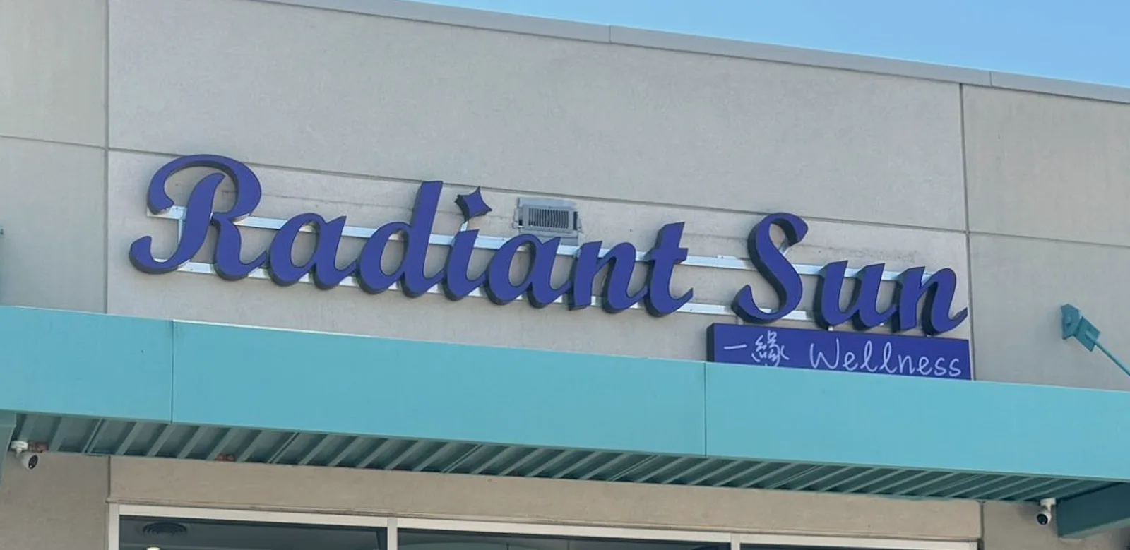 The Radiant Sun Wellness storefront sign on Highway 7 East in Markham.